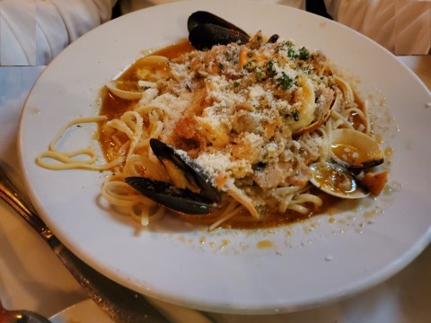 Malafemmina, seafood medley over a bed of linguine with white clam sauce at Alaine's Osteria in Palmetto Bay