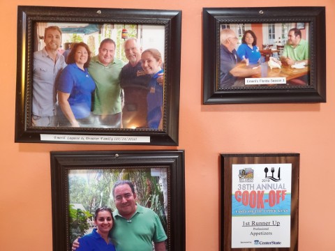 Emeril Lagasse photos with owners at Key Largo Conch House