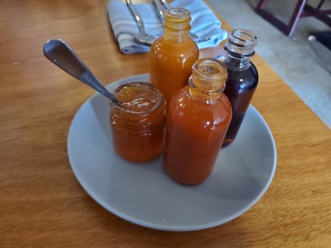 Buffalo Sauce, Honey Syrup, Habanero Sauce, Apricot Jam at Rosie's in Miami