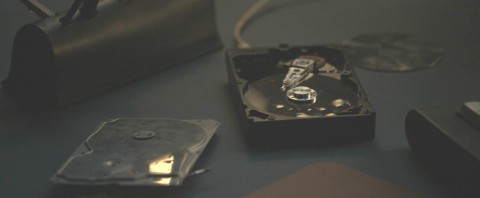 Repairwork on the hard drive in Silo Season 2 Episode 5 Descent