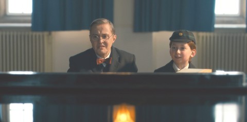 Music Teacher and kid practicing piano in Devils Chord Doctor who