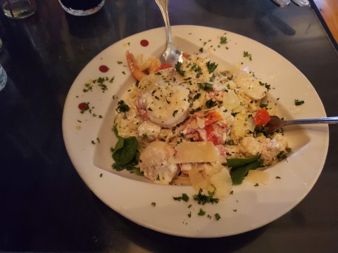 Mom's Wish (sauteed lobster, jumbo shrimp, scallops) over capellini pasta at White Lion Cafe in Homestead