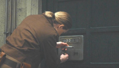 Jules Nichols showing her craftiness picking a lock with a badge