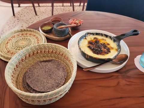 Queso Fundido Chorizo with blue corn tortilla salsa, guacamole at Koko in Coconut Grove