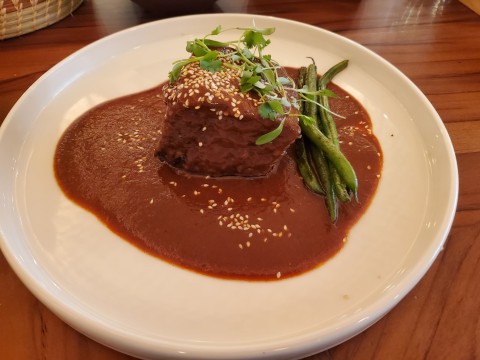 Mole Coloradito Short Rib with sesame seeds, string beans and house rice at Koko in Coconut Grove