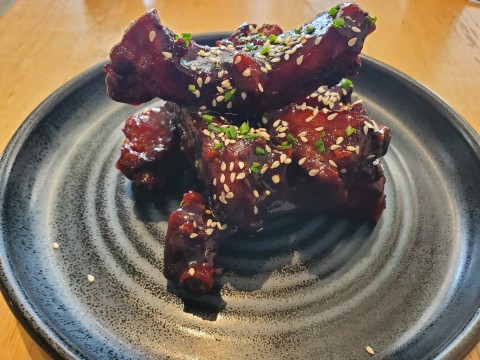 A closer look at the sticky baby back ribs at the Bachour restaurant and bakery in Coral Gables