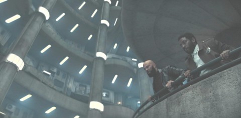 Sims and Billings look after Jules jumps over the stairwell in Silo