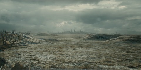 Actual scene (?) with city ruins in the distance