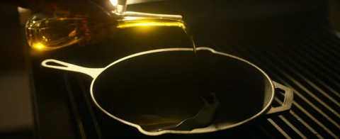 Olive oil into pan