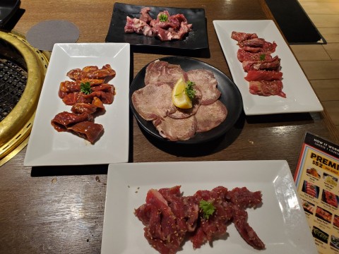 Prime Kalibi Short Rib (right), Beef Tongue (center), Harami Skirt Steak (top), Premium Sirloin (left), Filet Mignon (bottom)