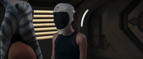 Sabine wearing a helmet shielding her sight