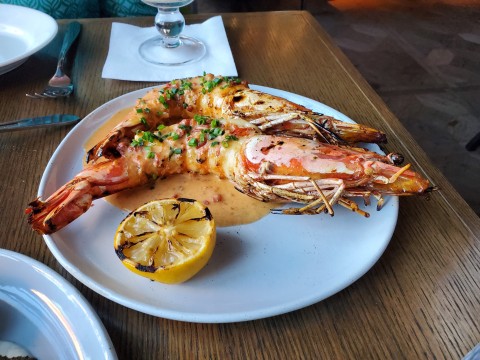 Grilled Giant Prawns in kosho citrus butter and herbs, at Klaw Restaurant in Miami