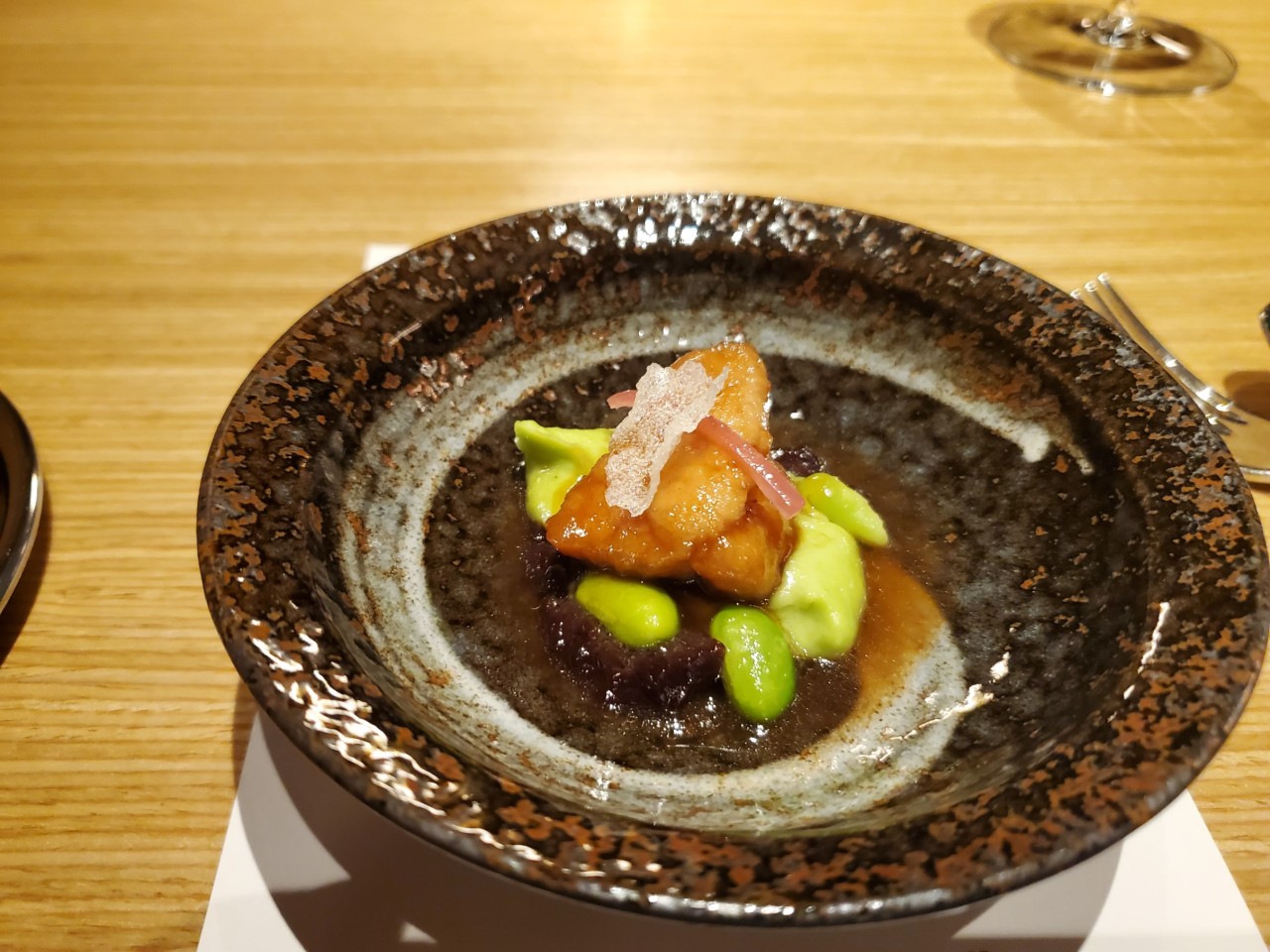 Amuse Bouche - Sweetbread with edamame, oyster sauce from the 2024 Winter Menu