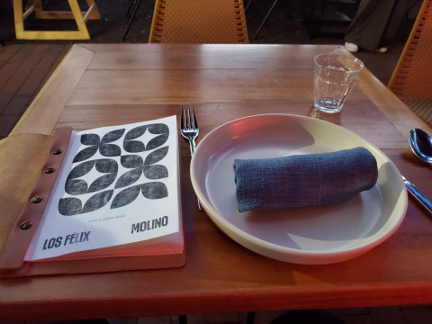 Table placing with wine menu at Los Felix in Coconut Grove